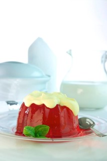 Red jelly with vanilla sauce