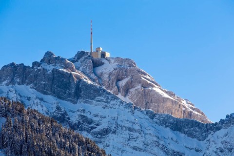 The snow-covered summit of Mt Santis