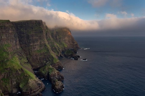 Cliffs and sea in evening light
