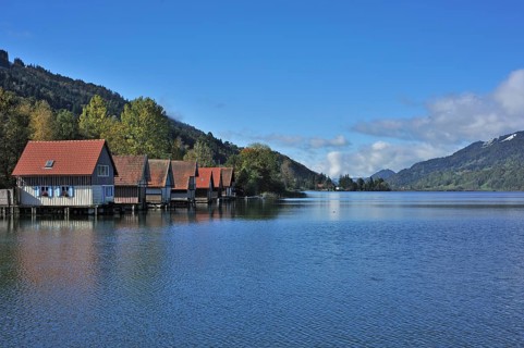 Alpsee lake with boathouses