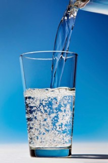 Water is being poured into a glass