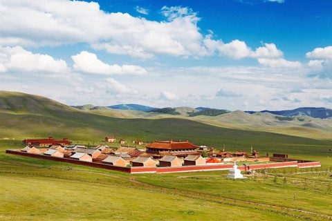 Amarbayasgalant Monastery in green grass landscape