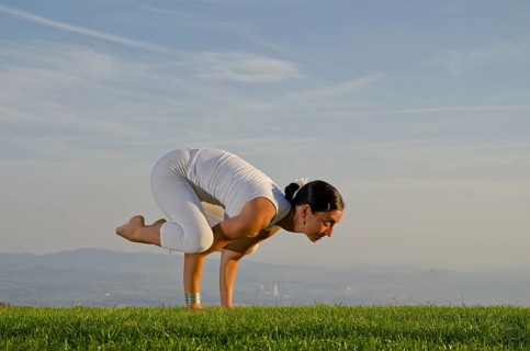 Young woman practising Hatha yoga