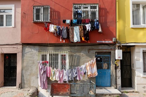 Laundry hanging on washing lines on a facade