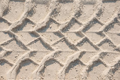 Tire tracks in the sand