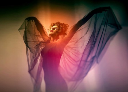 Young woman with wing veil