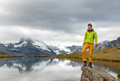 Hiker stands on rock