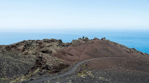 Hiking trail through a lava landscape