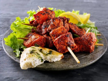 Chicken Tikka with salad and naan bread