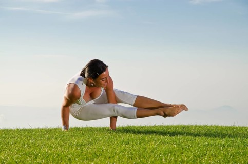Young woman practising Hatha yoga