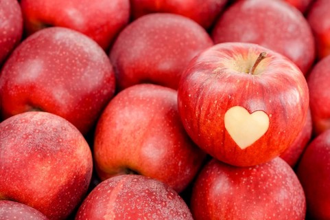Apple with a heart shape cut-out