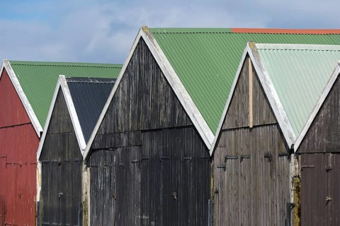 Coloured boathouses