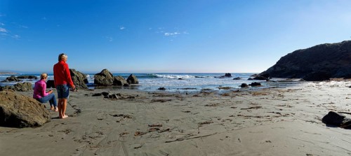 Two women on the sandy beach