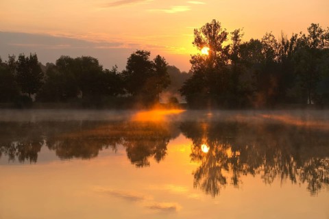 Sunrise over a pond
