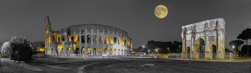 Full moon over Colosseum and Constantine Arch at night