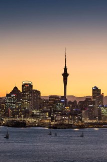 Skyline of Auckland with the Sky Tower at dusk