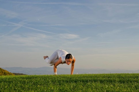 Young woman practising Hatha yoga