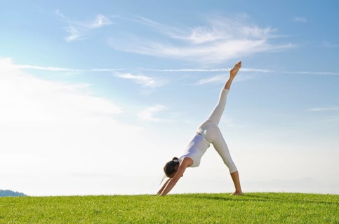 Young woman practising Hatha yoga