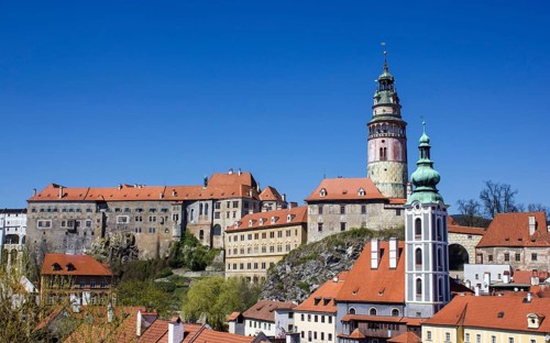 St. Jost Church in front of Cesky Krumlov Castle with the castle tower