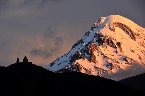 Summit of Mount Kazbek with Zminda Sameba pilgrims monastery
