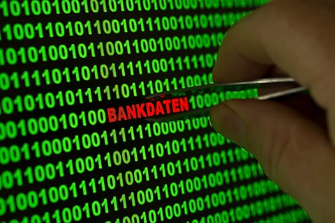 Hand reaching for the word 'Bankdaten'