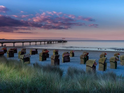 Beach chairs on the beach at dusk