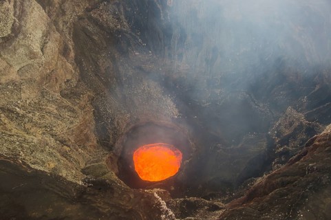 Glowing lava lake in the caldera of the Ambrym volcano