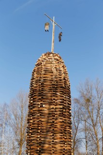 A built-up wooden tower with witches for the bonfire