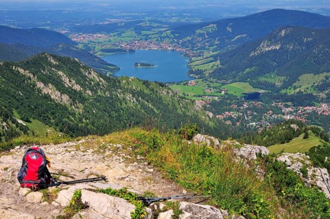 Backpack and hiking poles at a lookout point