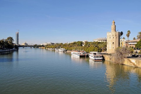 Excursion boats on the bank of the Guadalquivir River