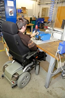 Mentally and physically disabled man at work