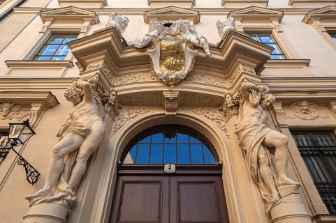 Entrance porch with two Atlas figures from the Liechtenstein City Palace