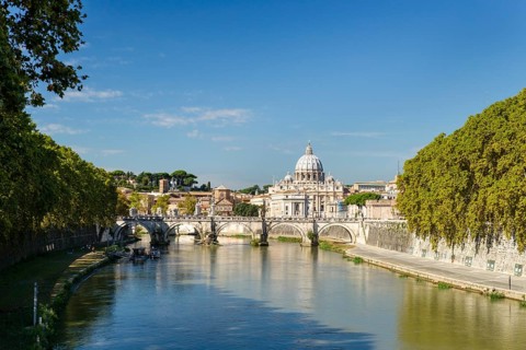 View from Ponte Umberto I across the Tiber River to Ponte Sant'Angelo and St. Peter's Basilica