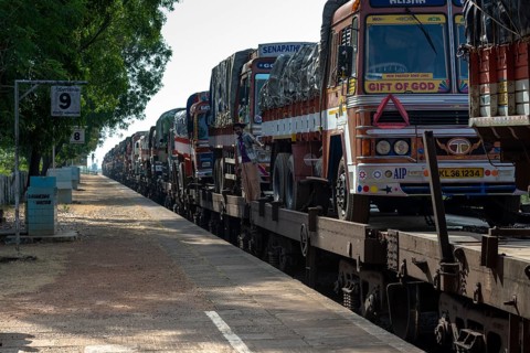 Trucks transported on train