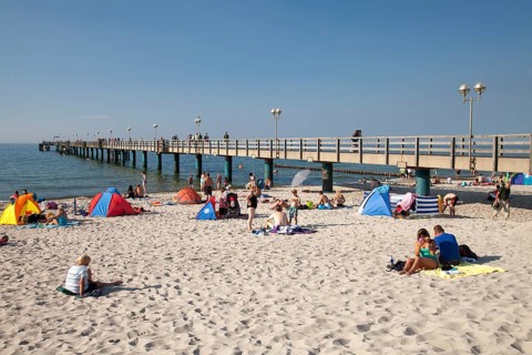Sandy beach and pier