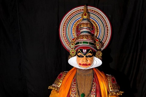 Katakali artist posing dressed up as Shiva