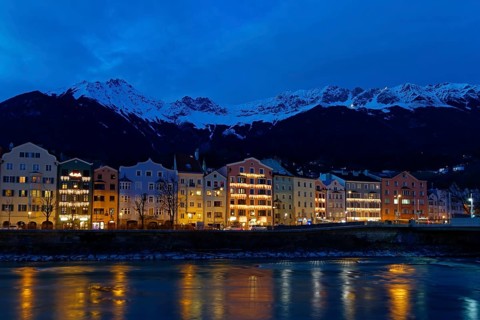 Buildings on the Inn River at dusk