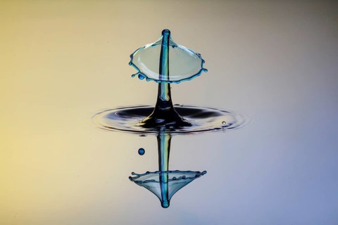 Three drops collide