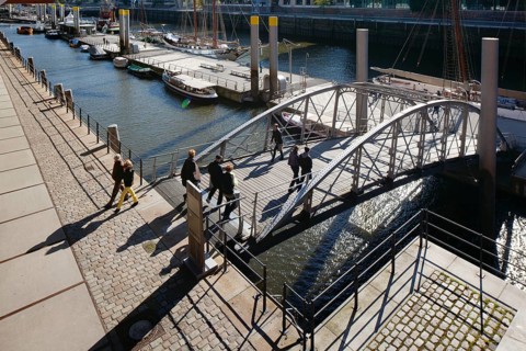 Bridge to the pontoon of the Traditional Ship Harbor with historic sailing ships