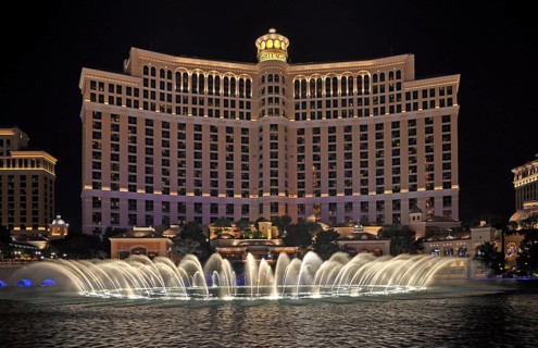 Bellagio Hotel and Casino with dancing water fountain show at night