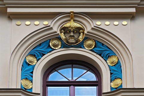 Decorative element above a window