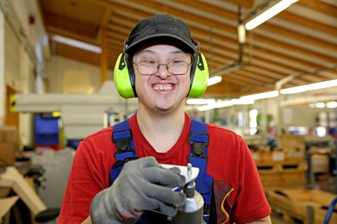 Man with Down syndrome at work