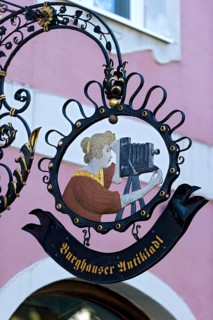 Wrought iron hanging sign