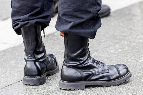 Member of a right-wing Hungarian party wearing combat boots