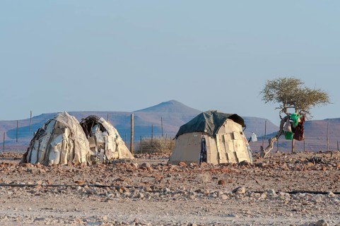 Traditional huts built from cardboard
