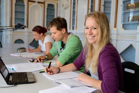 Students studying in the departmental library of the University of Hohenheim in Schloss Hohenheim Palace