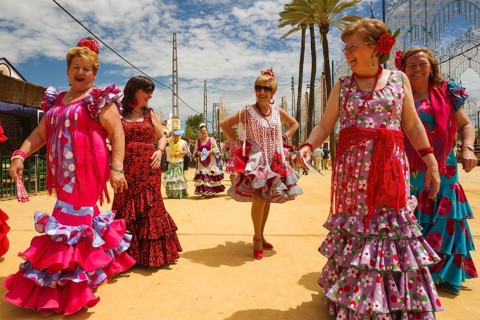 Women wearing gypsy dresses at the Feria del Caballo