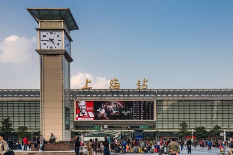 Central Station with clock tower and people in front of the entrance