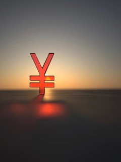 Yen sign made of red glass