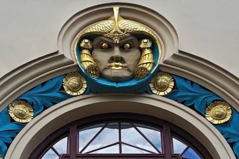 Decorative element above a window